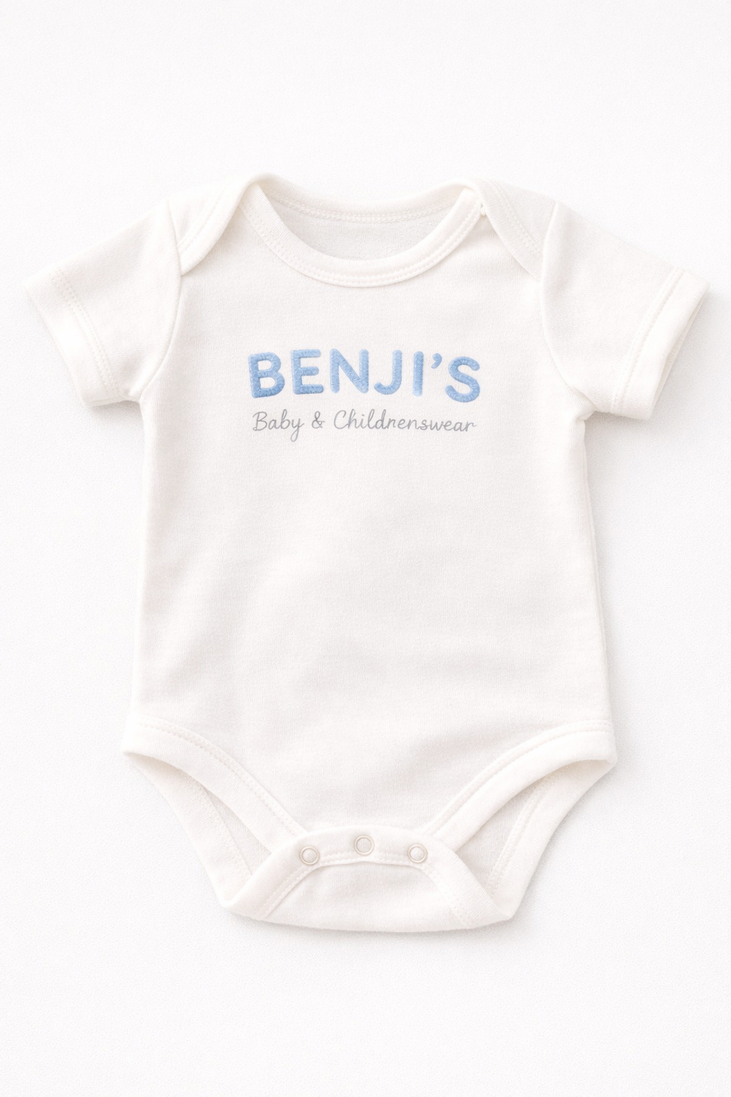 BENJI’S Baby White Cotton Onesie – Soft Blue Embroidered Logo