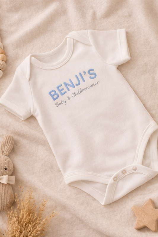 BENJI’S Baby White Cotton Onesie – Soft Blue Embroidered Logo